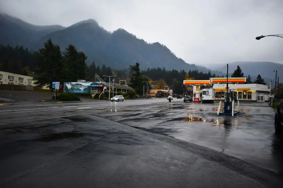 Rainy roadside gas station in the mountains
