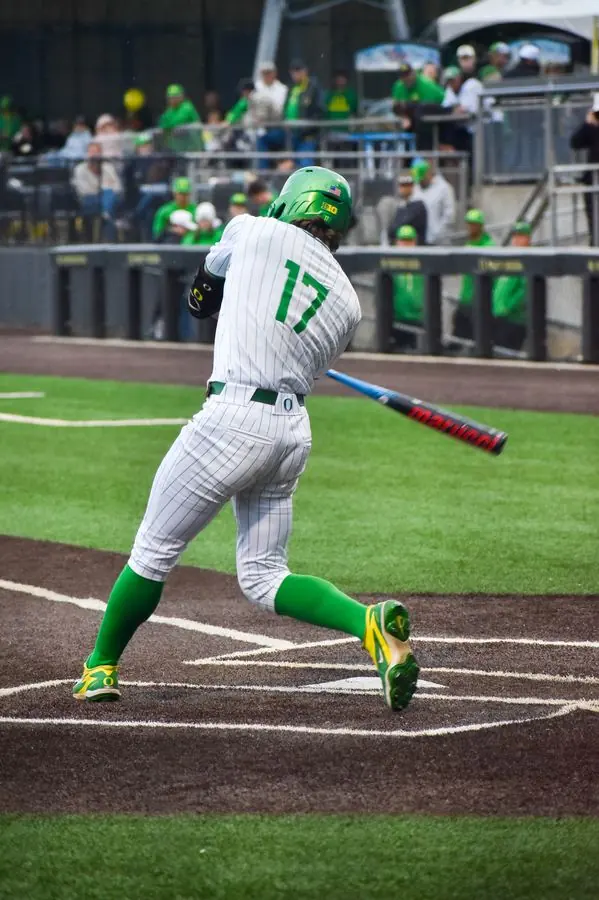 Oregon baseball player swinging, No. 17
