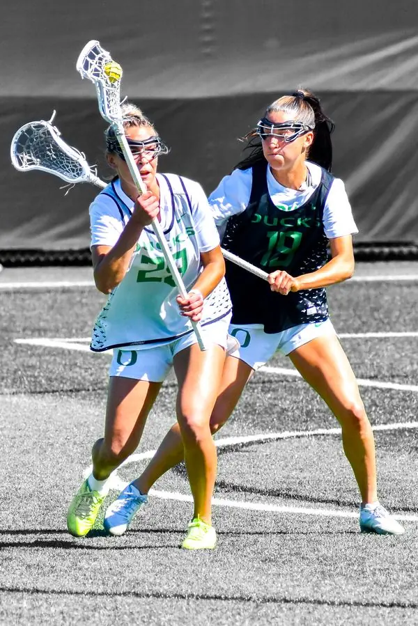 Oregon Ducks women's lacrosse players in a drill
