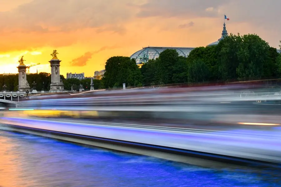 Long-exposure boat on the Seine at sunset, Paris