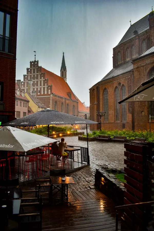 Rainy canal-side cafe, Riga