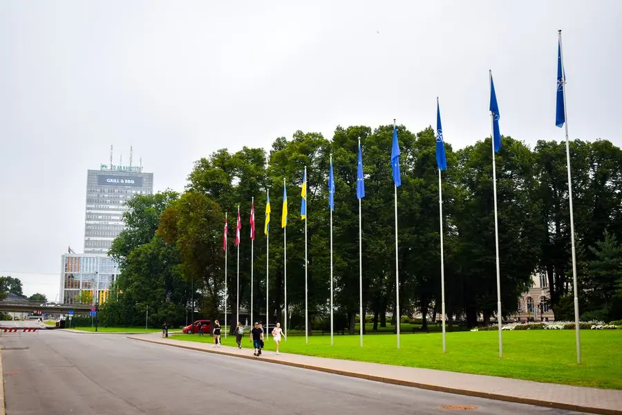 Flags lining a park path, Riga