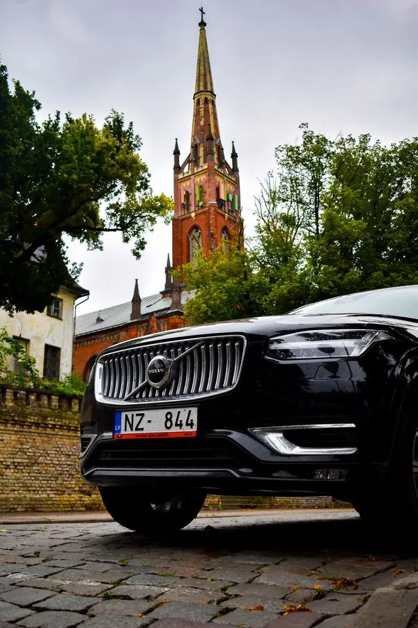 Volvo grille with a church spire, Riga
