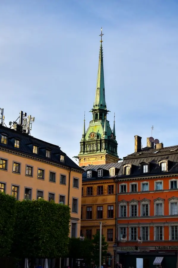 Church spire above Stockholm rooftops
