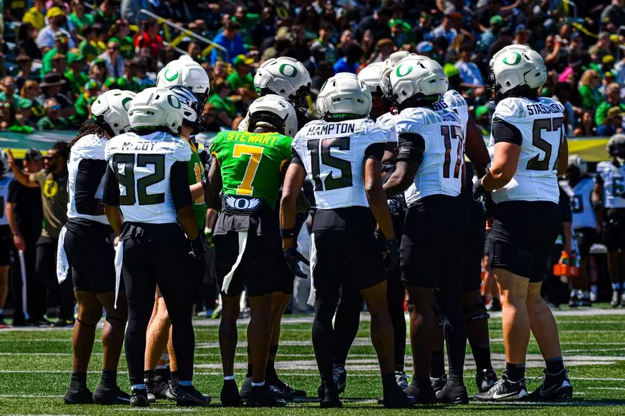 Oregon Ducks football huddle before a play