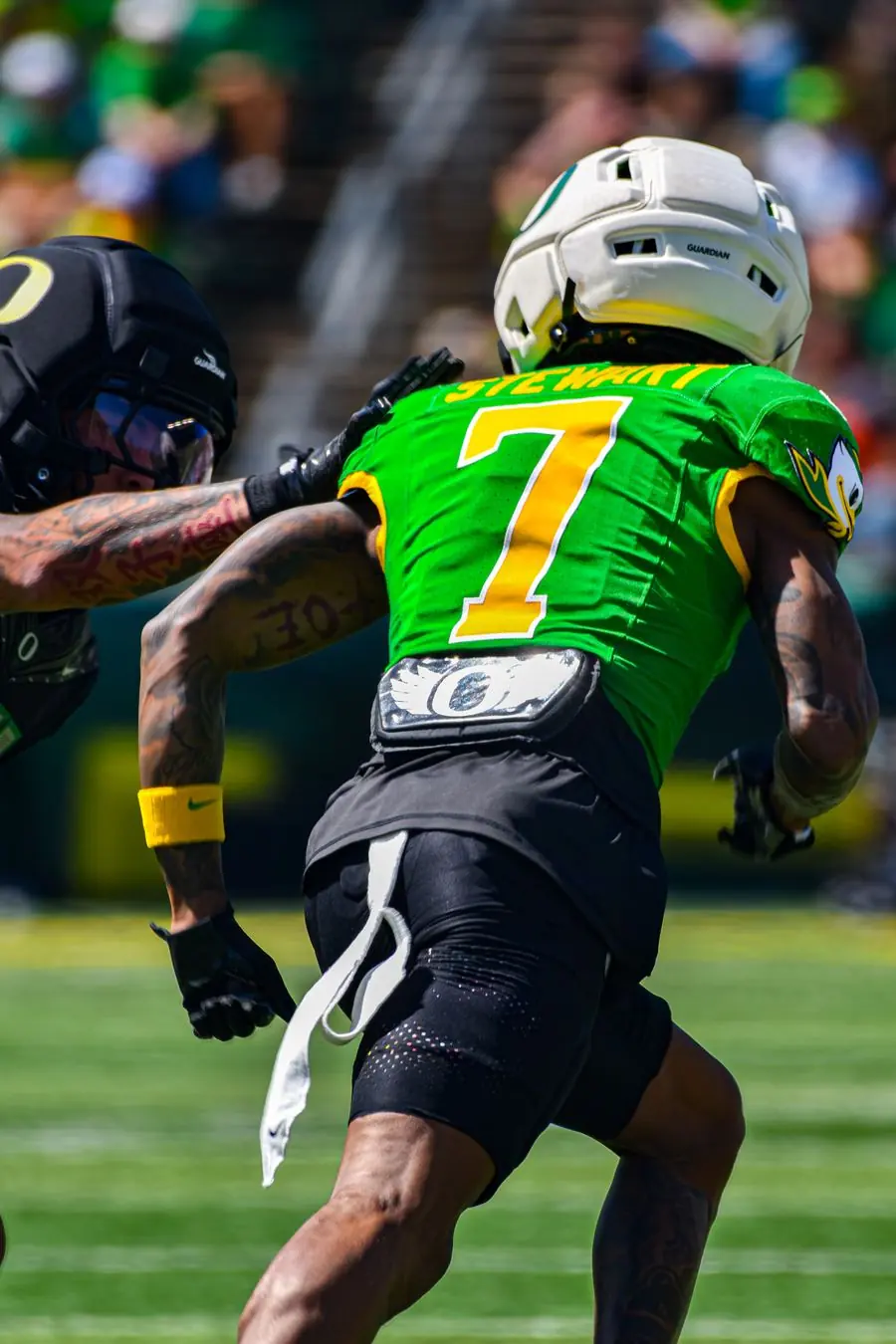 Oregon Ducks football player number 7 from behind