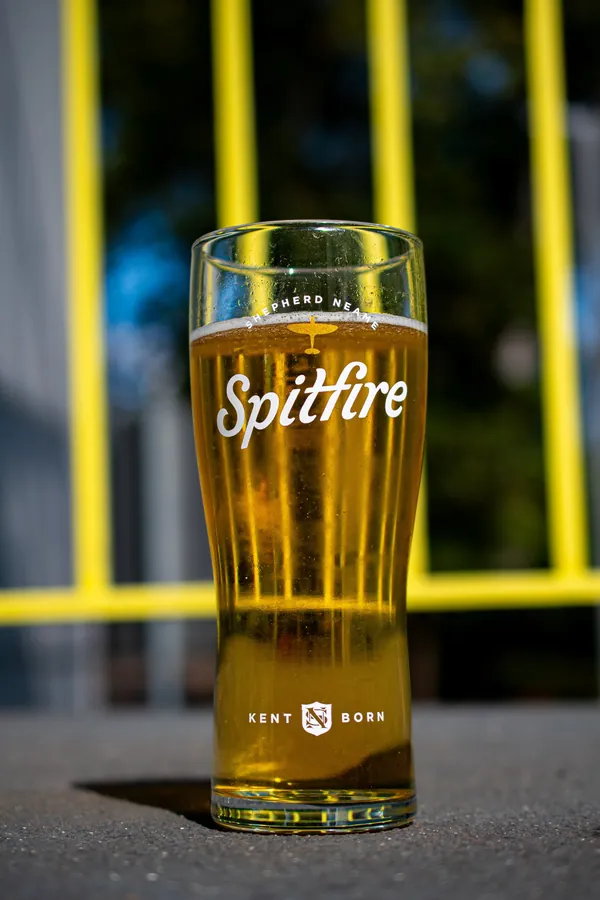 Shepherd Neame Spitfire ale in a pint glass, England